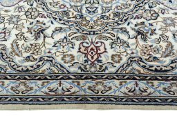 Corner detail of New Nain rug showing border pattern and Wool pile
