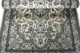 Close-up detail of New Nain rug from Iran / Persia showing Wool weave