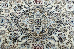 Central medallion detail of New Nain rug from Iran / Persia
