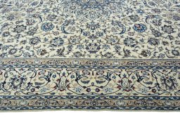 Corner detail of New Nain rug showing border pattern and Wool pile