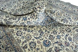 Surface texture of New Nain rug with natural Wool and intricate pattern