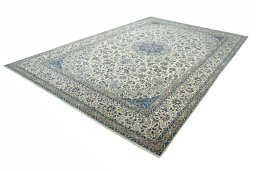 Corner detail of New Nain rug showing border pattern and Wool pile