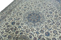 Backside of handmade New Nain rug showing knot structure and weave density