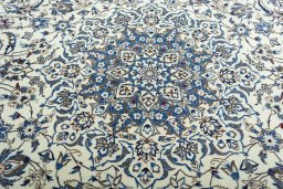 Central medallion detail of New Nain rug from Iran / Persia