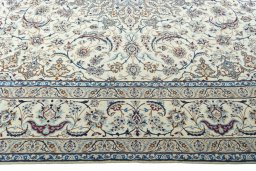 Corner detail of 2000s Nain rug showing border pattern and Wool pile