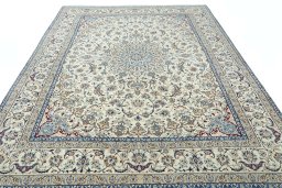 Surface texture of 2000s Nain rug with natural Wool and intricate pattern