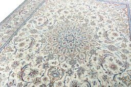Backside of handmade 2000s Nain rug showing knot structure and weave density