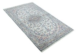 Close-up detail of New Nain rug from Iran / Persia showing Wool weave