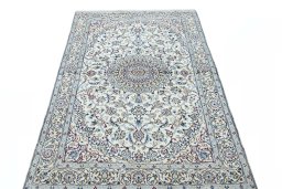 Surface texture of New Nain rug with natural Wool and intricate pattern