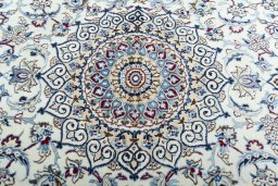 Central medallion detail of New Nain rug from Iran / Persia