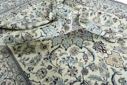 Surface texture of New Nain rug with natural Wool and intricate pattern