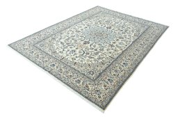 Corner detail of New Nain rug showing border pattern and Wool pile