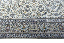 Corner detail of New Nain rug showing border pattern and Wool pile