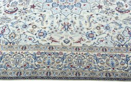 Corner detail of 2000s Nain rug showing border pattern and Wool pile