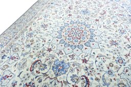 Backside of handmade 2000s Nain rug showing knot structure and weave density
