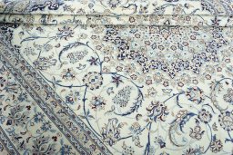 Close-up detail of 2000s Nain rug from Iran / Persia showing Wool weave