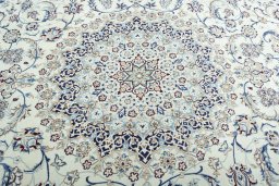 Central medallion detail of 2000s Nain rug from Iran / Persia