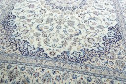 Close-up detail of 2000s Nain rug from Iran / Persia showing Wool weave