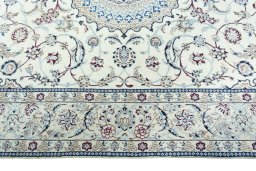 Corner detail of New Nain rug showing border pattern and Wool pile