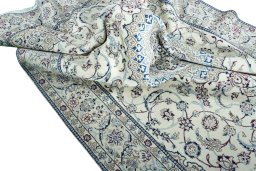 Surface texture of New Nain rug with natural Wool and intricate pattern