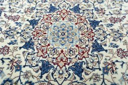 Central medallion detail of 2000s Nain rug from Iran / Persia