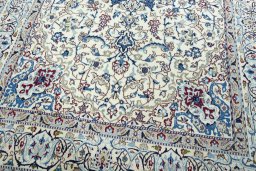Close-up detail of 2000s Nain rug from Iran / Persia showing Wool weave