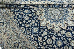 Close-up detail of 2000s Nain rug from Iran / Persia showing Wool weave