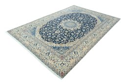Corner detail of 2000s Nain rug showing border pattern and Wool pile