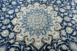 Central medallion detail of 2000s Nain rug from Iran / Persia