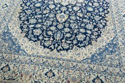 Close-up detail of 2000s Nain rug from Iran / Persia showing Wool weave