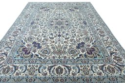Surface texture of 2000s Nain rug with natural Wool and intricate pattern