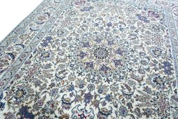 Backside of handmade 2000s Nain rug showing knot structure and weave density