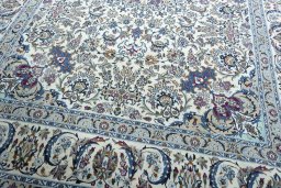 Close-up detail of 2000s Nain rug from Iran / Persia showing Wool weave