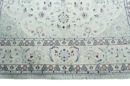 Full view of 2000s Nain rug from Iran / Persia, 295 × 198 cm in Beige tones