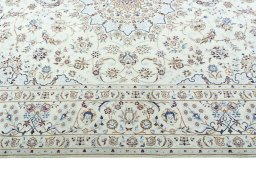 Corner detail of 2000s Nain rug showing border pattern and Wool pile