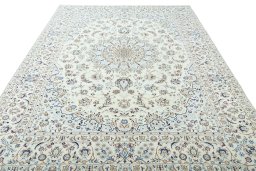 Surface texture of 2000s Nain rug with natural Wool and intricate pattern