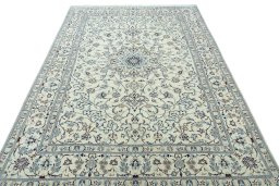 Surface texture of New Nain rug with natural Wool and intricate pattern