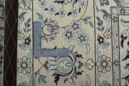 Backside of handmade 2000s Nain rug showing knot structure and weave density