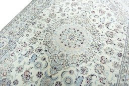 Backside of handmade 2000s Nain rug showing knot structure and weave density