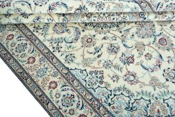 Close-up detail of 2000s Nain rug from Iran / Persia showing Wool weave
