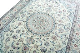 Backside of handmade 2000s Nain rug showing knot structure and weave density