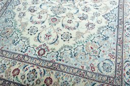 Close-up detail of 2000s Nain rug from Iran / Persia showing Wool weave