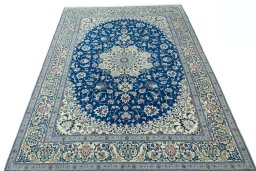 Surface texture of 2000s Nain rug with natural Wool and intricate pattern