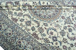 Close-up detail of 2000s Nain rug from Iran / Persia showing Wool weave