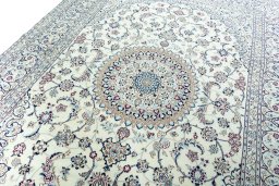 Backside of handmade 2000s Nain rug showing knot structure and weave density