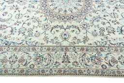 Corner detail of New Nain rug showing border pattern and Wool pile