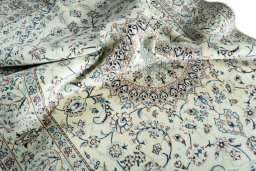 Surface texture of New Nain rug with natural Wool and intricate pattern