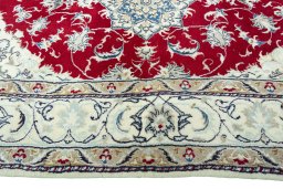 Corner detail of New Nain rug showing border pattern and Wool pile
