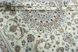 Close-up detail of 2000s Nain rug from Iran / Persia showing Wool weave