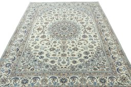 Surface texture of 2000s Nain rug with natural Wool and intricate pattern